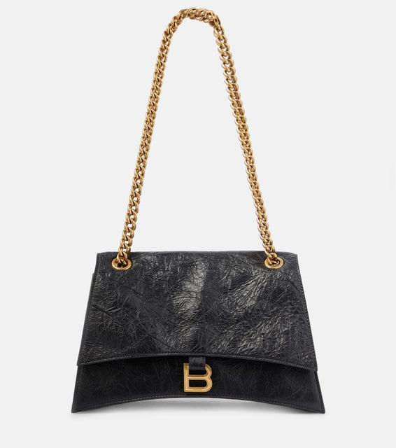 Balenciaga Crush Medium leather shoulder bag. Shop Balenciaga Shoulder Bags for women now.
