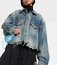 Balenciaga Distressed oversized denim jacket