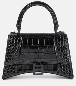 Balenciaga Hourglass Small leather shoulder bag. Shop Balenciaga Top-Handle Bags for women now.