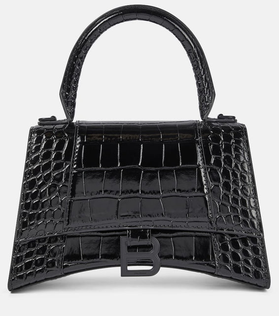 Balenciaga Hourglass Small leather shoulder bag. Shop Balenciaga Top-Handle Bags for women now.