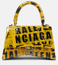 Balenciaga Hourglass Small tape-trimmed leather crossbody bag. Shop Balenciaga Shoulder Bags for women now.