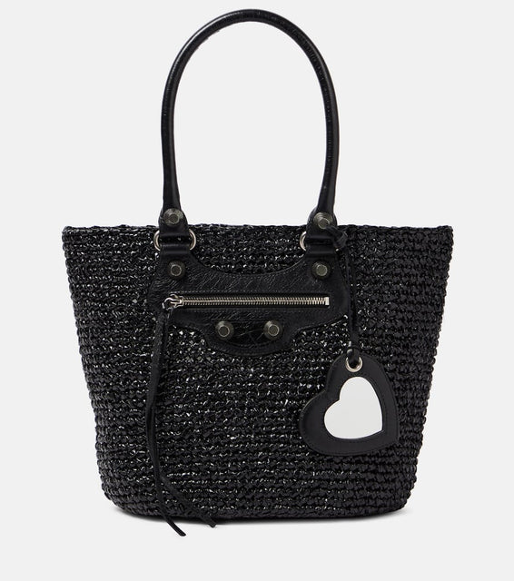 Balenciaga Le Cagole Medium raffia shoulder bag. Shop Balenciaga Tote Bags for women now.