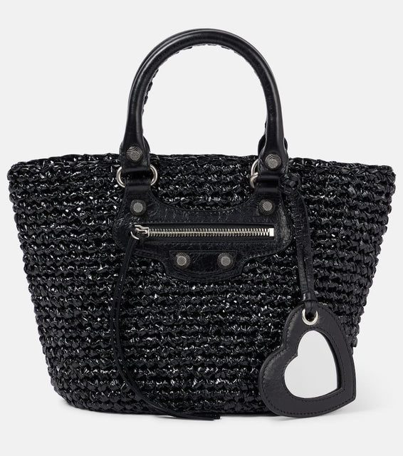 Balenciaga Le Cagole Panier Small raffia-effect basket bag. Shop Balenciaga Top-Handle Bags for women now.