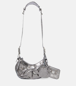 Balenciaga Le Cagole XS leather shoulder bag. Shop Balenciaga Shoulder Bags for women now.