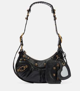 Balenciaga Le Cagole XS leather shoulder bag. Shop Balenciaga Shoulder Bags for women now.