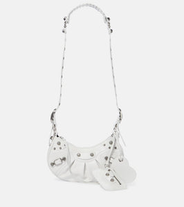 Balenciaga Le Cagole XS leather shoulder bag. Shop Balenciaga Shoulder Bags for women now.