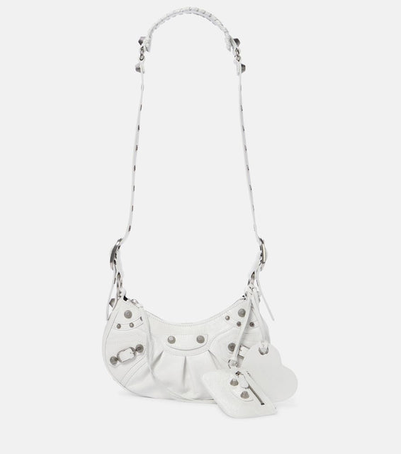 Balenciaga Le Cagole XS leather shoulder bag. Shop Balenciaga Shoulder Bags for women now.