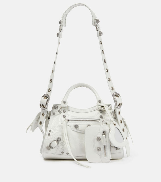 Balenciaga Neo Cagole XS leather shoulder bag. Shop Balenciaga Shoulder Bags for women now.