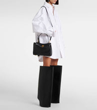 Balenciaga New Wander leather knee-high boots