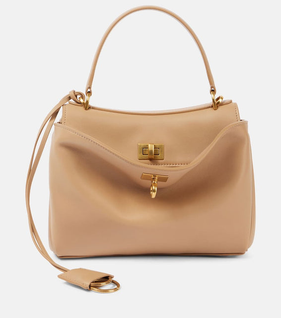 Balenciaga Rodeo Mini leather tote bag. Shop Balenciaga Top-Handle Bags for women now.