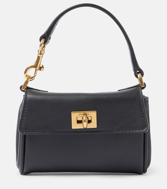 Balenciaga Rodeo Nano leather tote bag. Shop Balenciaga Top-Handle Bags for women now.