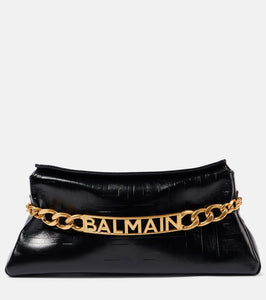 Balmain 1945 PB embossed leather clutch. Shop Balmain Clutches for women now.