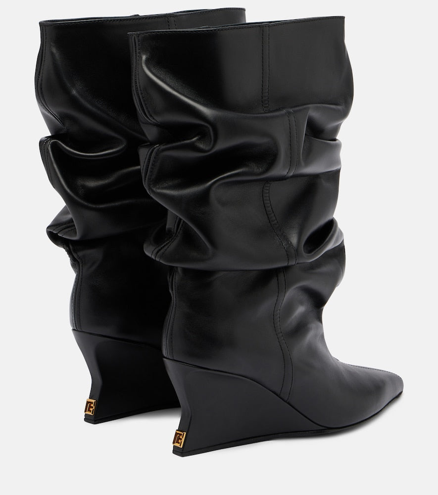 Balmain Leather wedge boots