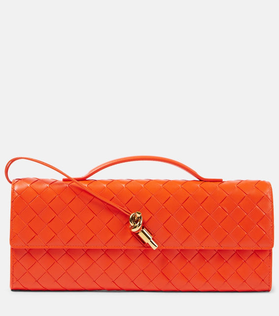 Bottega Veneta Andiamo Intrecciato leather clutch. Shop Bottega Veneta Clutches for women now.