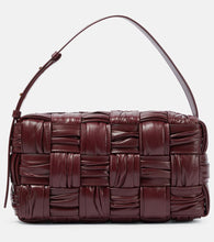 Bottega Veneta Brick Cassette Medium Intreccio leather shoulder bag. Shop Bottega Veneta Shoulder Bags for women now.