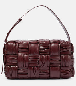 Bottega Veneta Brick Cassette Medium Intreccio leather shoulder bag. Shop Bottega Veneta Shoulder Bags for women now.