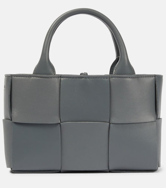 Bottega Veneta Candy Arco leather tote bag. Shop Bottega Veneta Top-Handle Bags for women now.