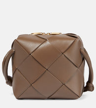 Bottega Veneta Cassette Mini leather camera bag. Shop Bottega Veneta Shoulder Bags for women now.