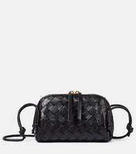 Bottega Veneta Concert Mini Intrecciato leather pouch. Shop Bottega Veneta Crossbody Bags for women now.