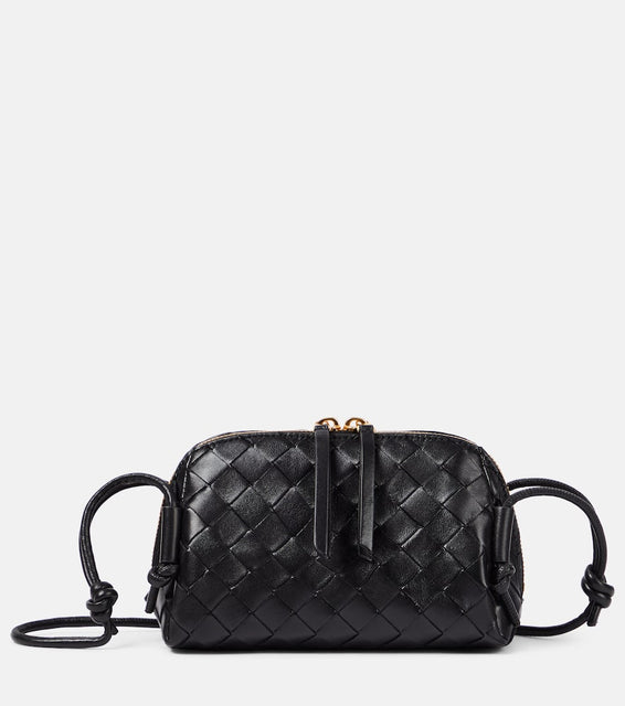 Bottega Veneta Concert Mini Intrecciato leather pouch. Shop Bottega Veneta Crossbody Bags for women now.