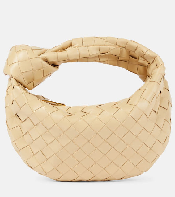 Bottega Veneta Jodie Mini leather tote. Shop Bottega Veneta Top-Handle Bags for women now.