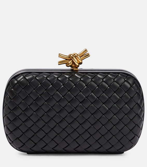 Bottega Veneta Knot Intreccio leather clutch. Shop Bottega Veneta Clutches for women now.