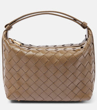 Bottega Veneta Wallace leather shoulder bag. Shop Bottega Veneta Top-Handle Bags for women now.