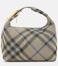 Burberry Medium jacquard duffel bag. Shop Burberry Top-Handle Bags for women now.