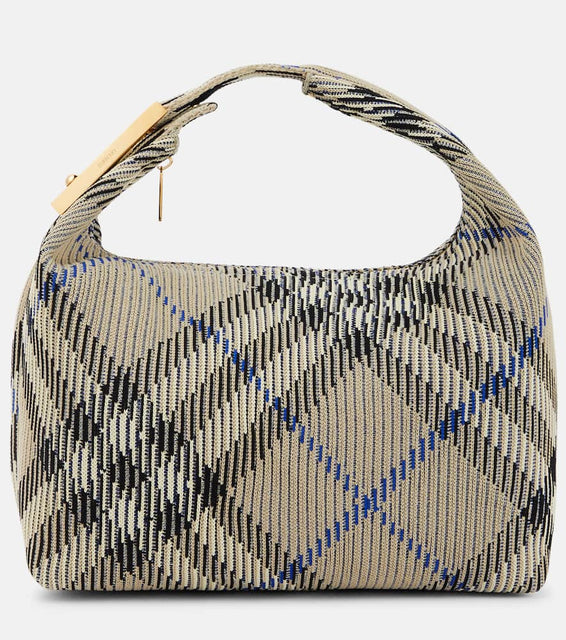 Burberry Medium jacquard duffel bag. Shop Burberry Top-Handle Bags for women now.