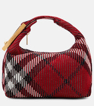 Burberry Peg Small jacquard duffel bag. Shop Burberry Top-Handle Bags for women now.