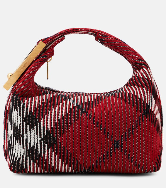 Burberry Peg Small jacquard duffel bag. Shop Burberry Top-Handle Bags for women now.