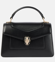 Bvlgari Serpenti Forever Mini leather shoulder bag. Shop Bvlgari Top-Handle Bags for women now.