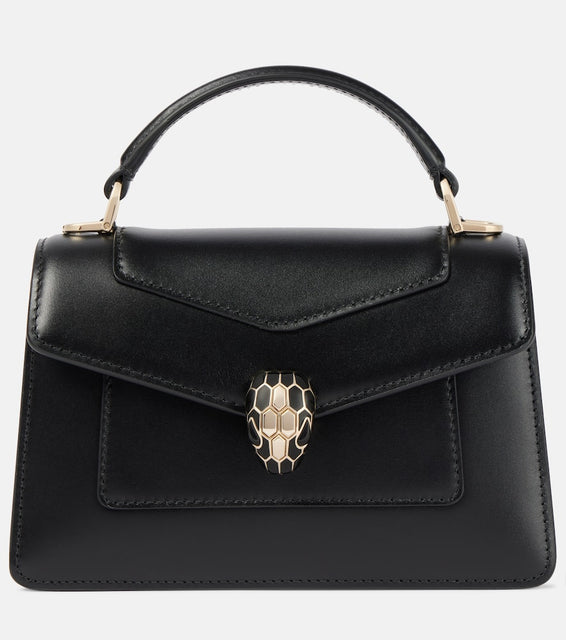 Bvlgari Serpenti Forever Mini leather shoulder bag. Shop Bvlgari Top-Handle Bags for women now.