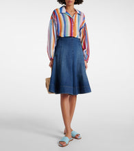 Christian Louboutin CL embossed leather mules