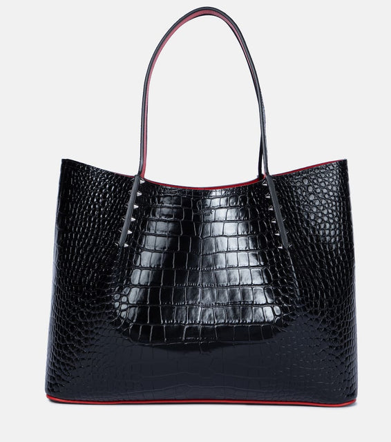 Christian Louboutin Cabarock Large studded leather tote. Shop Christian Louboutin Tote Bags for women now.