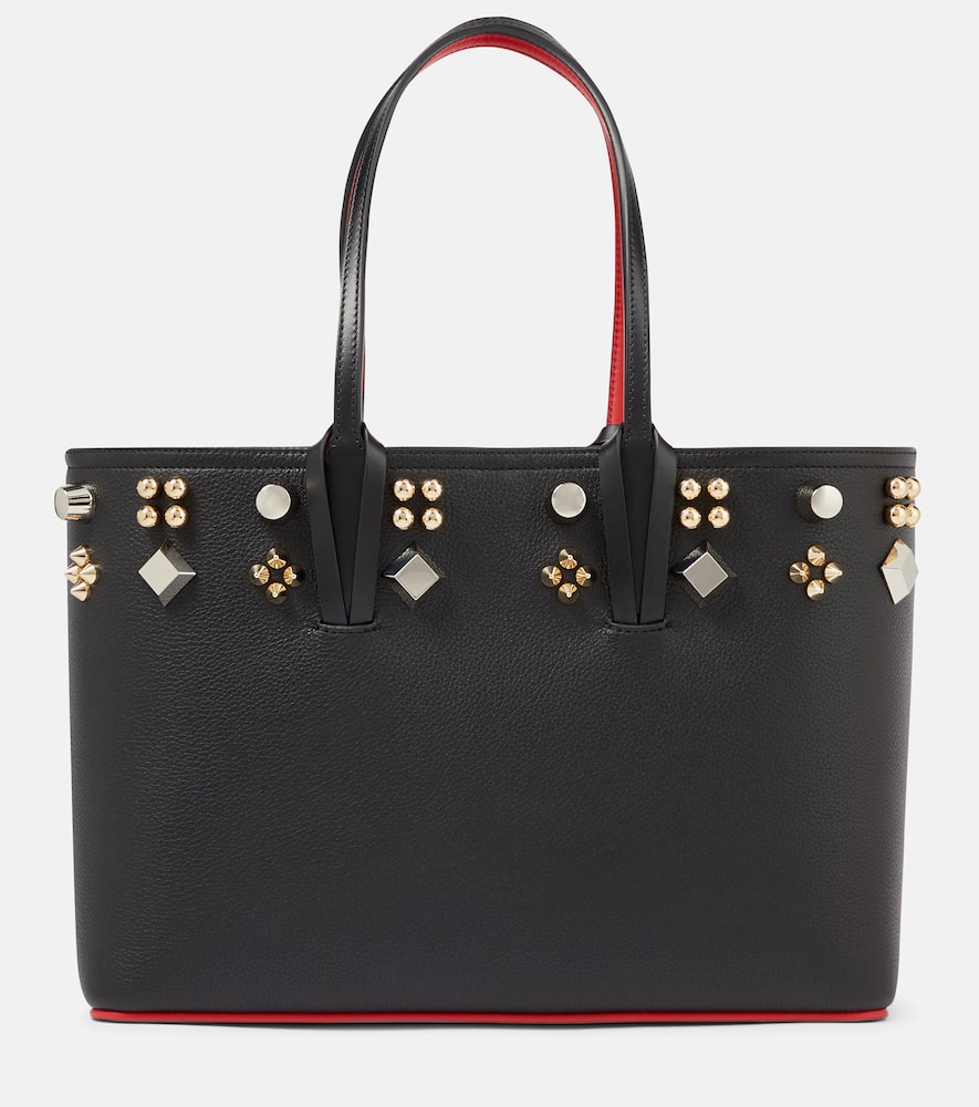 Christian Louboutin Cabata stud-embellished leather tote. Shop Christian Louboutin Tote Bags for women now.