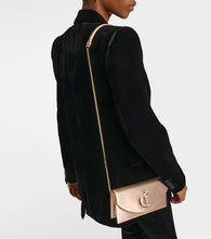 Christian Louboutin Loubi54 Small leather-trimmed silk clutch