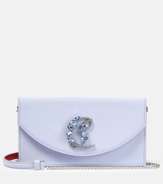Christian Louboutin Loubi54 patent leather clutch. Shop Christian Louboutin Clutches for women now.