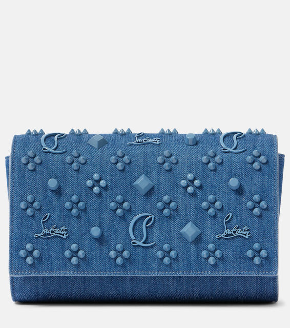 Christian Louboutin Paloma denim clutch. Shop Christian Louboutin Clutches for women now.