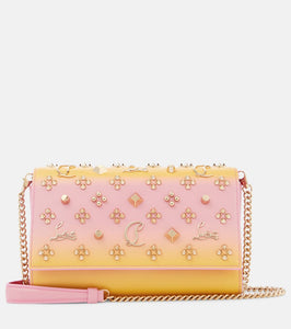 Christian Louboutin Paloma embellished leather clutch. Shop Christian Louboutin Clutches for women now.