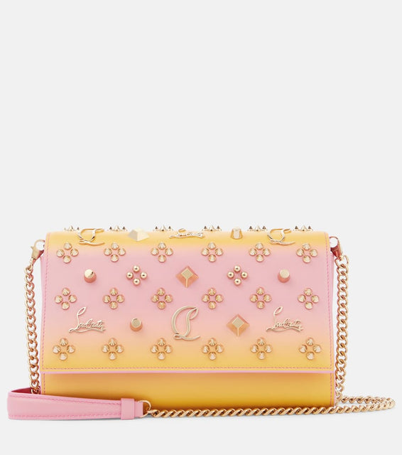 Christian Louboutin Paloma embellished leather clutch. Shop Christian Louboutin Clutches for women now.