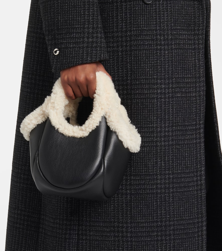 Coperni Swipe Mini faux fur-trimmed leather bucket bag