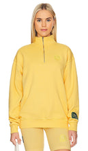 DANZY Quarter Zip in Yellow - DANZY Quart de fermeture éclair en jaune - DANZY 黄色四分之一拉链 - DANZY Quarter Zip in Gelb - DANZY 쿼터 지퍼 옐로우 색상 - Zip a un quarto DANZY in giallo