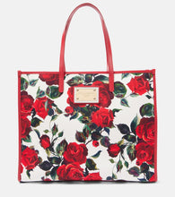 Dolce&Gabbana Large leather-trimmed canvas shopper. Shop Dolce&Gabbana Tote Bags for women now.