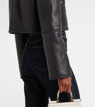 Dolce&Gabbana Shearling-trimmed cropped leather jacket