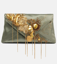 Dries Van Noten Embellished satin shoulder bag. Shop Dries Van Noten Clutches for women now.