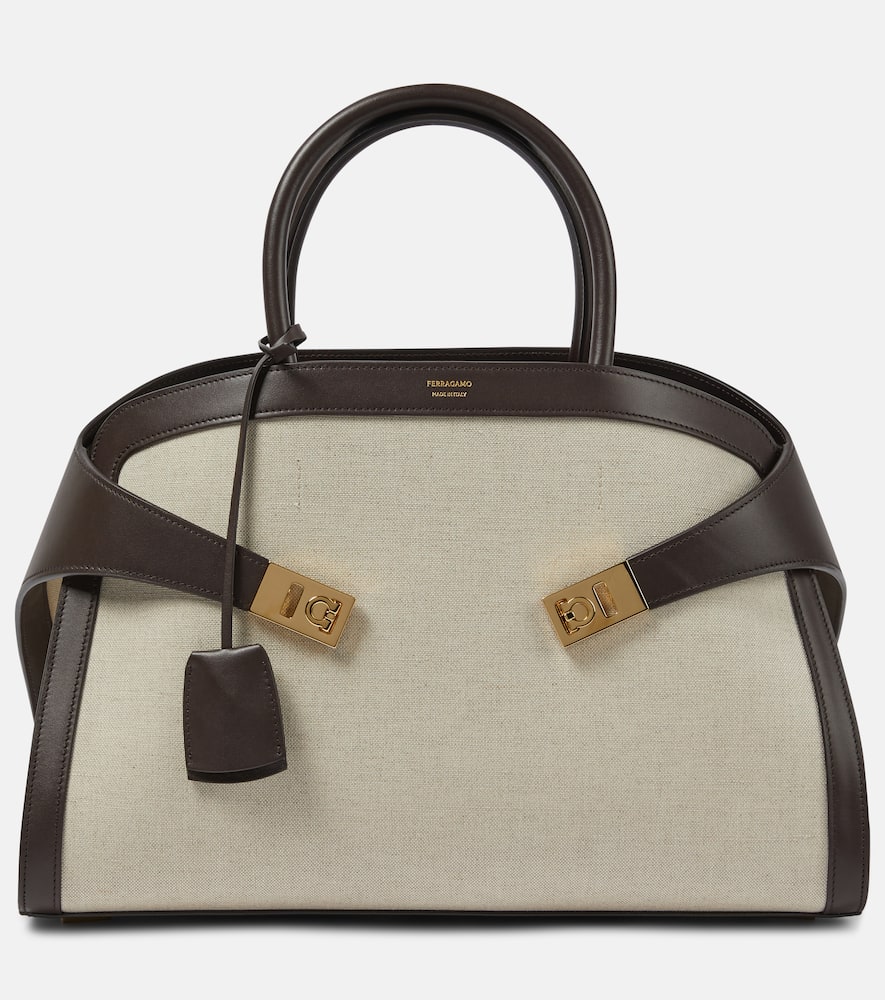 Ferragamo Hug Medium canvas and leather tote bag. Shop Ferragamo Tote Bags for women now.