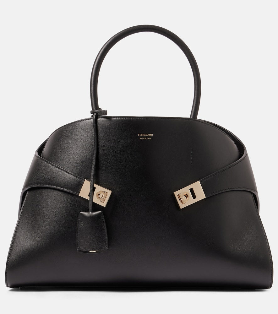 Ferragamo Hug Medium leather tote bag. Shop Ferragamo Top-Handle Bags for women now.