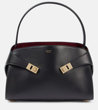 Ferragamo Hug Soft Medium leather shoulder bag. Shop Ferragamo Top-Handle Bags for women now.