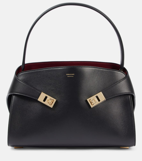 Ferragamo Hug Soft Medium leather shoulder bag. Shop Ferragamo Top-Handle Bags for women now.